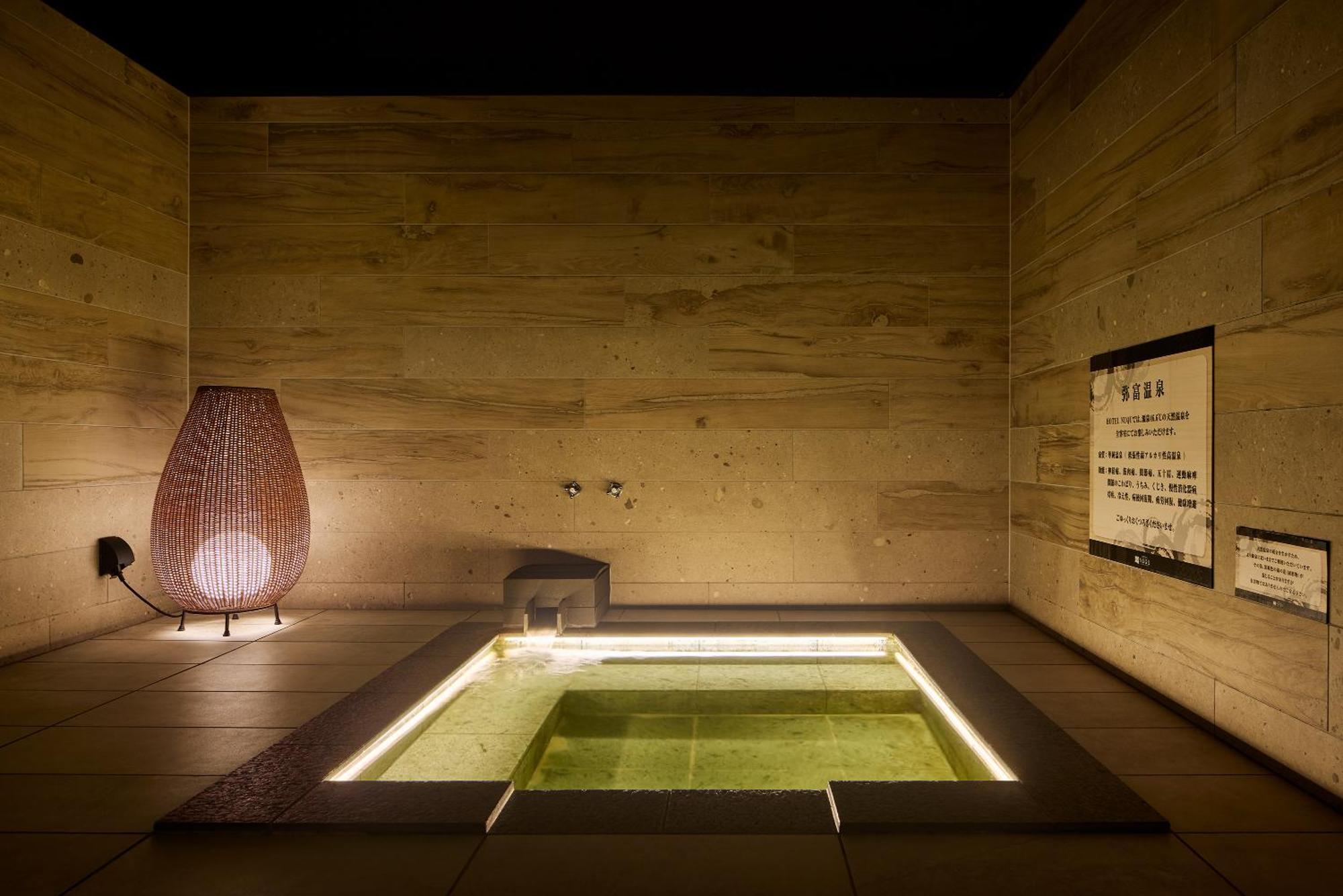Yatomi Hotel Nuqu Natural Hot Spring Bagian luar foto